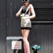 1960's black straw hat with built in sunglasses. 1960's black and white check bathing suit. 1970's canvas multi-stripe platforms