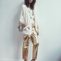 1980's Bonnie Boerer 'NWT' white vest with gold stars / 1980's Bonnie Boerer 'NWT' white studded cardigan / 1980's (from the Bonnie Boerer estate) gold leather pants / 1980's silver leather with gold elephant purse / Stuart Weitzman fringe sandals