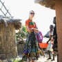 Official Zambia soccer T-shirt from Kamwala market; Chitenge wrap skirt by Kamangawear; Shoes by Daniele Michetti; Sunglasses by Fendi