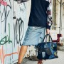 Vintage DKNY skirt, Stella McCartney plaid and denim top and Loewe leather and denim bag