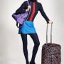 o Top: Cedric Charlier o Turtleneck: Stylist’s own o Skirt: Cedric Charlier o Tights: We Love Colors o Shoes: Jimmy Choo o Bags: Alvar in Honeycomb, Super City in Purple Dahlia