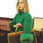 Green jacket with fur trim at Lisa Victoria